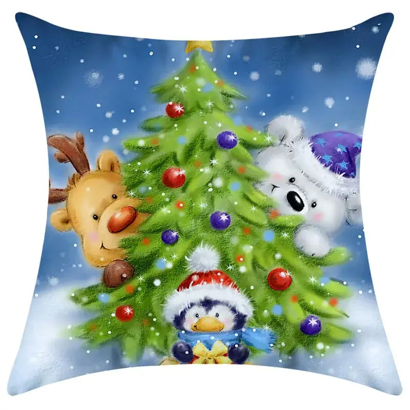 Festive decorbites christmas pillowcase featuring a cartoon christmas tree with reindeer polar bear and penguin characters