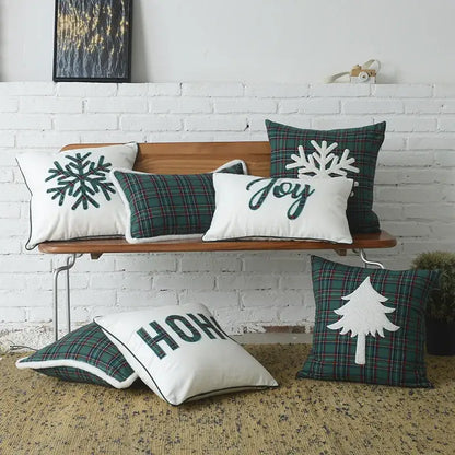 Set of DecorBites christmas plaid cotton cushion covers in green and white with snowflake embroidery and festive designs