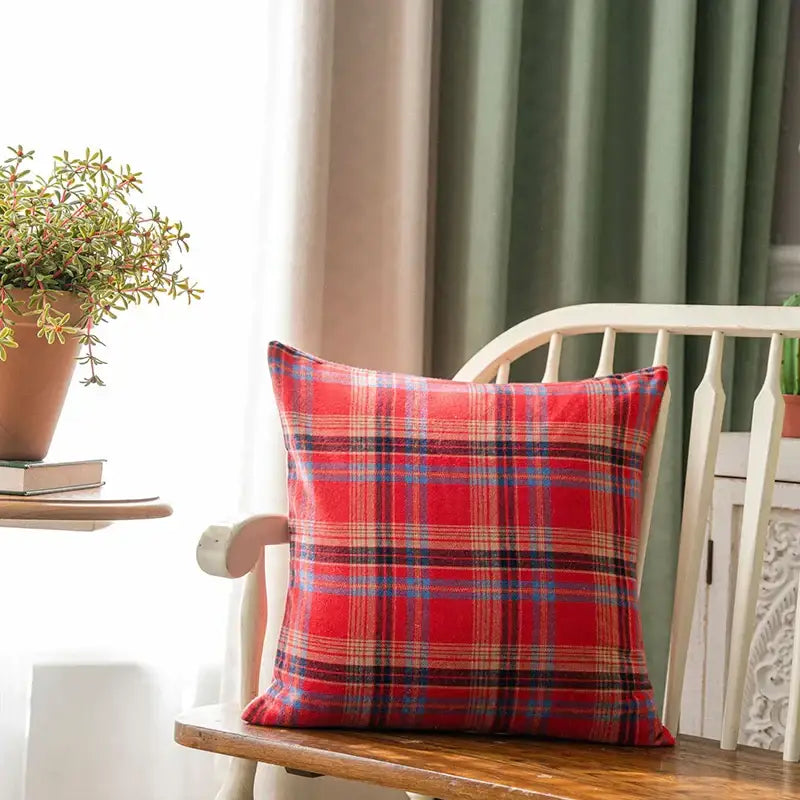 Red plaid cushion cover with blue and beige stripes on wooden chair decorbites christmas plaid holiday decor pillow case