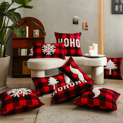 Red and black plaid cushion cover with white embroidered snowflakes trees and ho ho text by decorbites christmas plaid