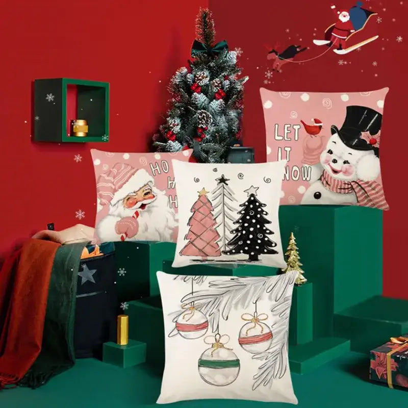 Decorbites christmas santa claus linen pillow cover featuring festive santa, snowmen, and trees in pink, white, red, and black tones