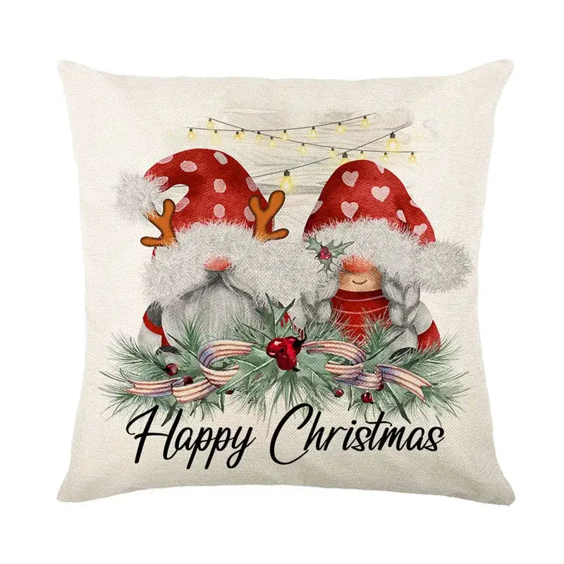 Beige linen pillow cover with decorbites christmas santa claus featuring two festive gnomes and happy christmas script