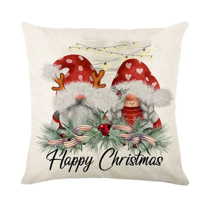 Beige linen pillow cover with decorbites christmas santa claus featuring two festive gnomes and happy christmas script