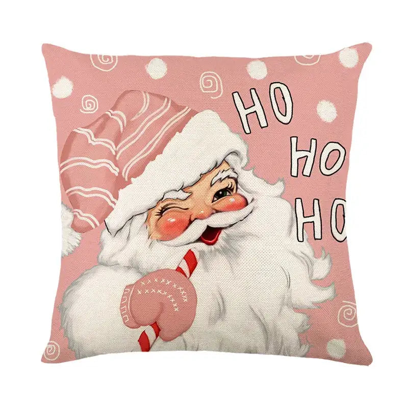 Pink linen pillow cover featuring vintage-style santa claus with white beard holding a candy cane by DecorBites Christmas Santa