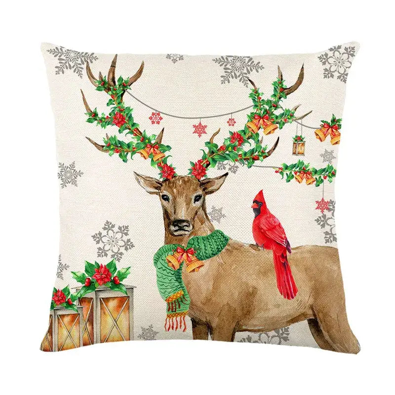 Decorbites christmas snow elk pillow cover featuring a brown deer with holly antlers and a red cardinal for festive decor
