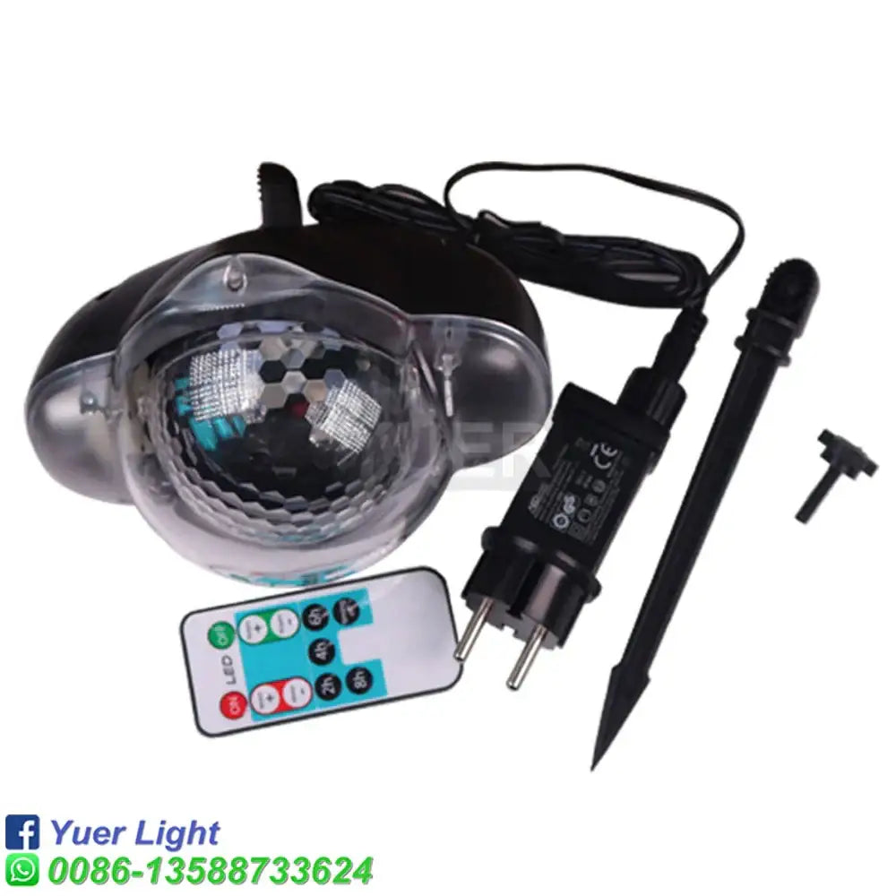 Decorbites christmas snow projector lights with black and clear plastic disco ball, remote control, power adapter, and stake