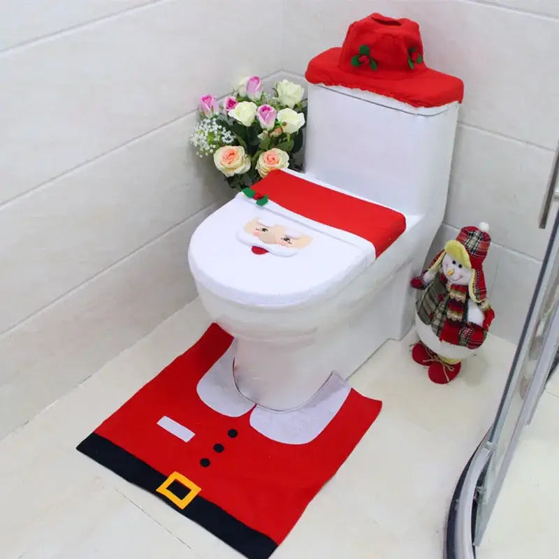 Red santa claus-themed decorbites christmas toilet decoration set with plush fabric and embroidered details