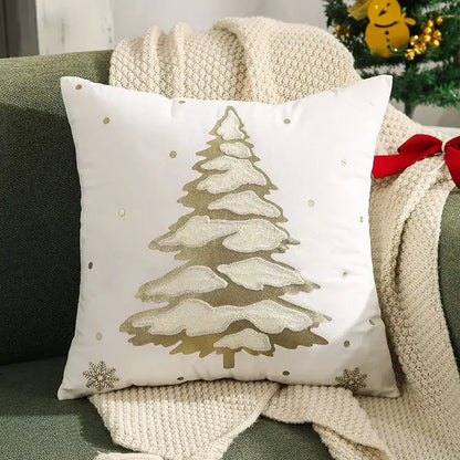 White decorbites christmas tree cushion cover featuring an embroidered gold christmas tree with snow and metallic dots