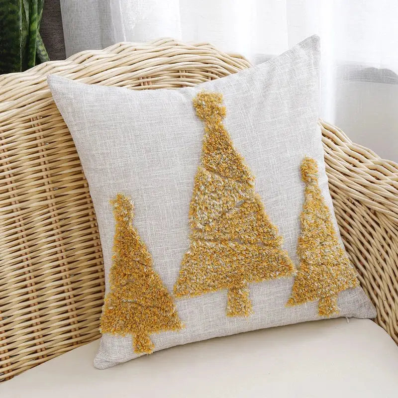Light gray linen pillow cover with three textured gold christmas tree appliqués decorbites christmas tree gold design