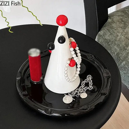 White ceramic clown-shaped jewelry stand with red and black accents for decorbites christmas tree necklace and earrings storage