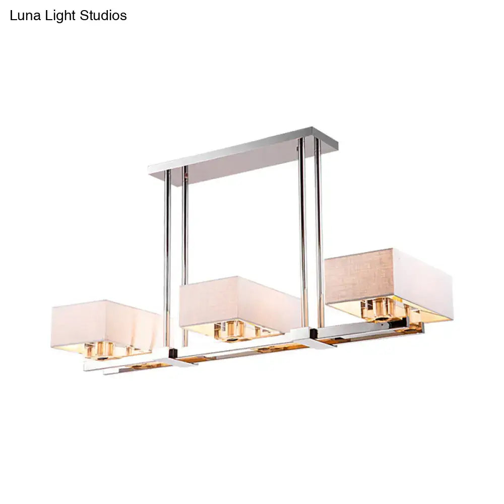 Modern rectangular pendant light by decorbites with chrome finish and beige fabric shade for dining room lighting