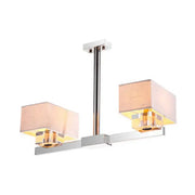DecorBites chrome pendant light with beige fabric shade and gold-accented glass fixtures for dining room use