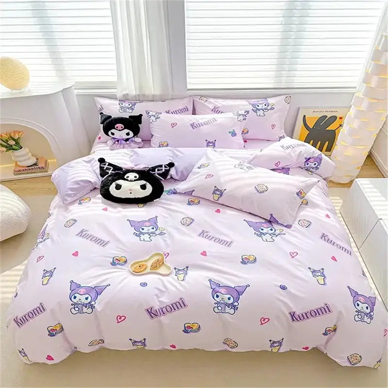 Pastel pink kuromi-themed bedding set with plush black and purple pillows perfect for cute home decor and duvet cover use