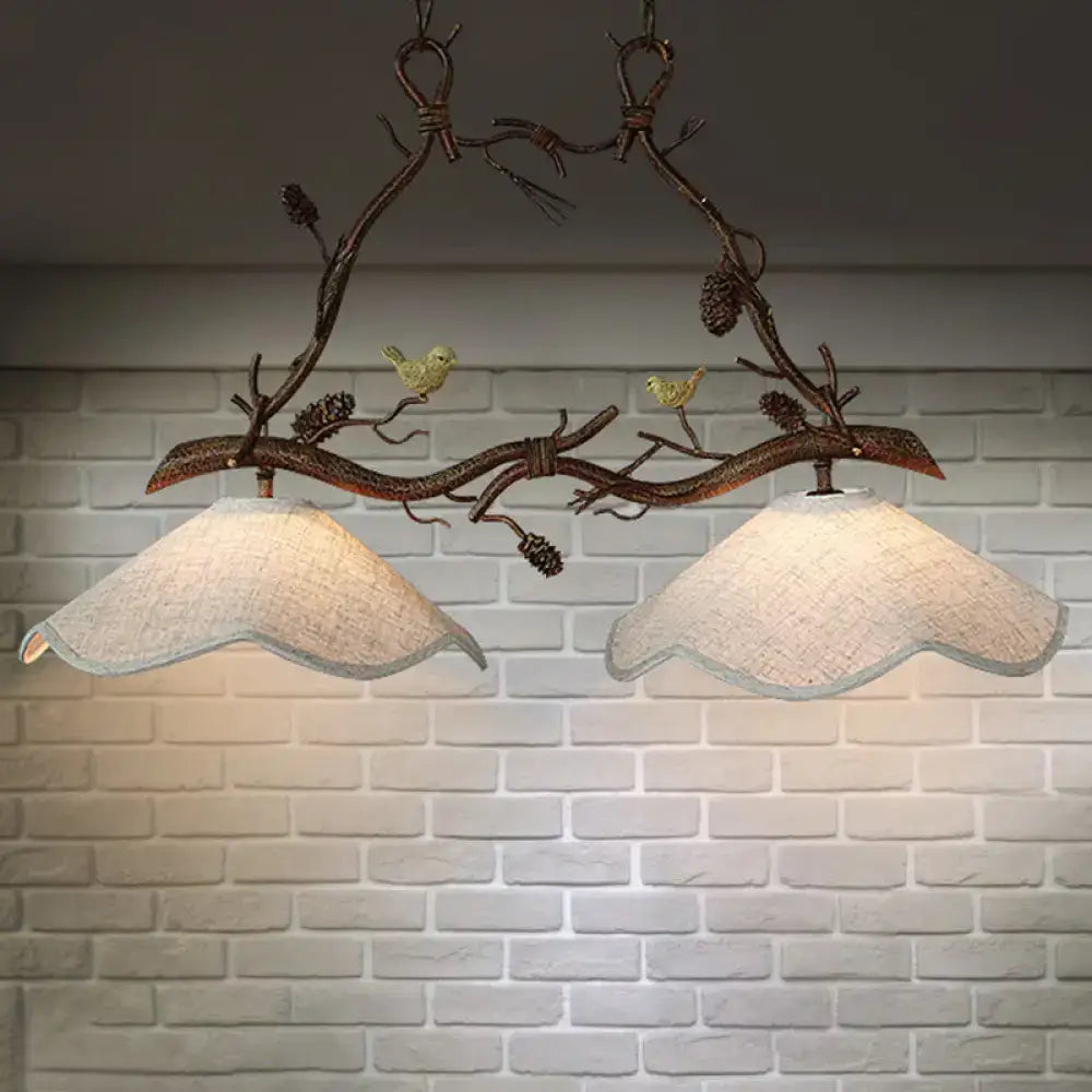 DecorBites™ classic 2-head resin branch suspension light with beige scalloped fabric shades and yellow bird figurines in brown