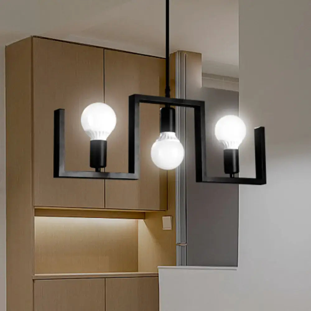 DecorBites™ classic black metal pendant light with three exposed bulbs and metal island fixture width design