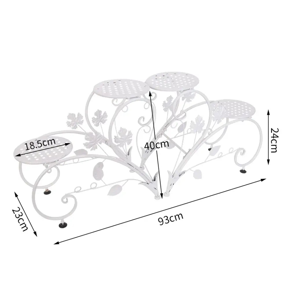 White metal classic tall plant stand with floral vine designs and four perforated circular shelves for indoor outdoor use