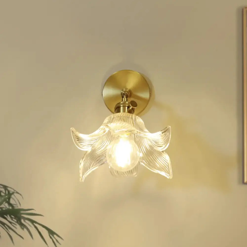 Decorbites clear flower glass wall lamp with delicate clear glass flower design and brass pull chain mounting plate
