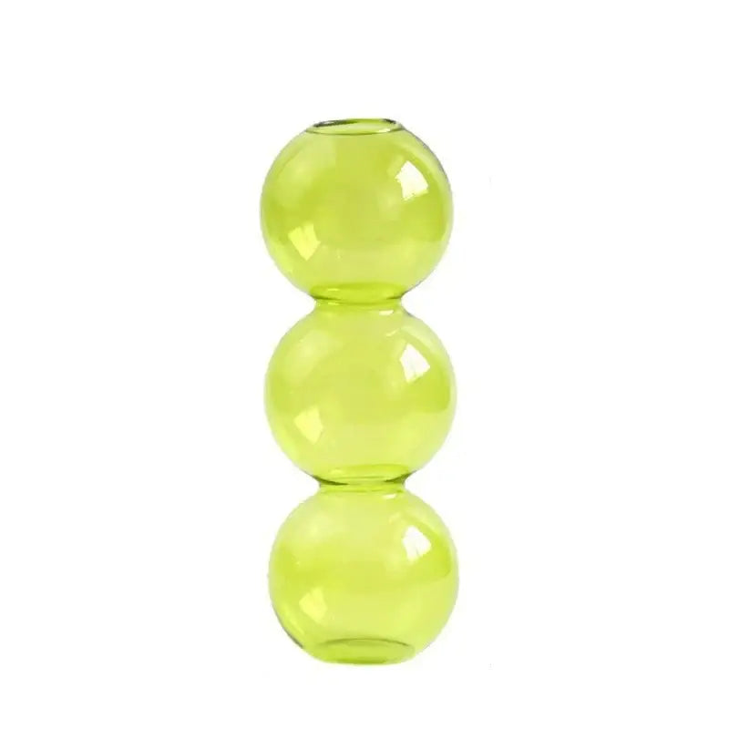 DecorBites™ clear glass bubble vase in translucent lime green comprised of three stacked spherical segments for home decor