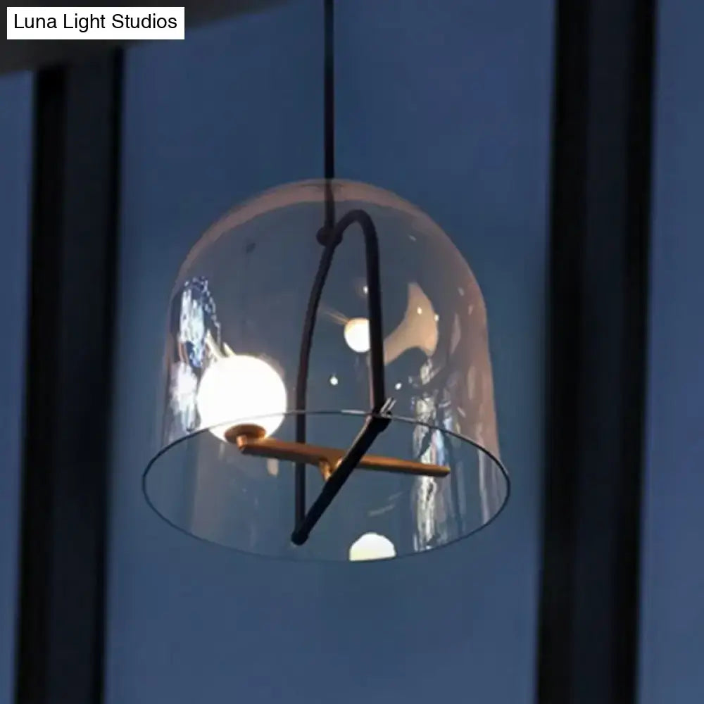 DecorBites clear glass cylinder ceiling light with black metal frame and brass accents for modern living room
