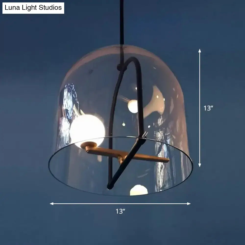DecorBites™ clear glass cylinder ceiling light with clear glass dome, black metal frame, and brass accents for modern living room