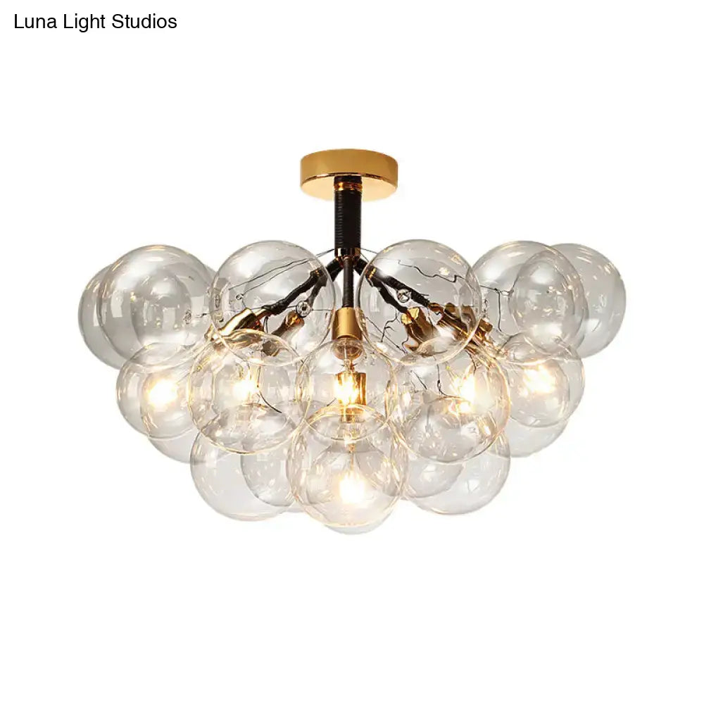DecorBites™ clear glass semi flush ceiling light with brass accents and exposed filament bulbs for foyer illumination