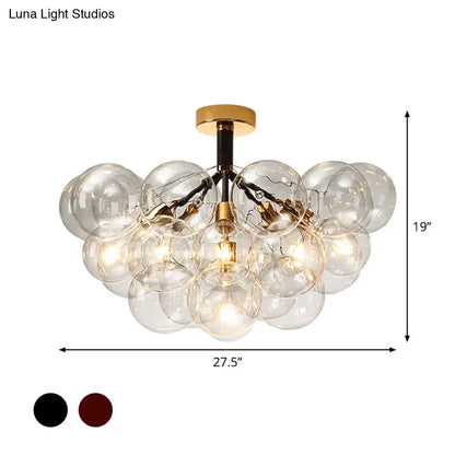 Gold-toned DecorBites™ semi flush ceiling light with clear glass spheres for foyer and corridor illumination, available in black or burgundy