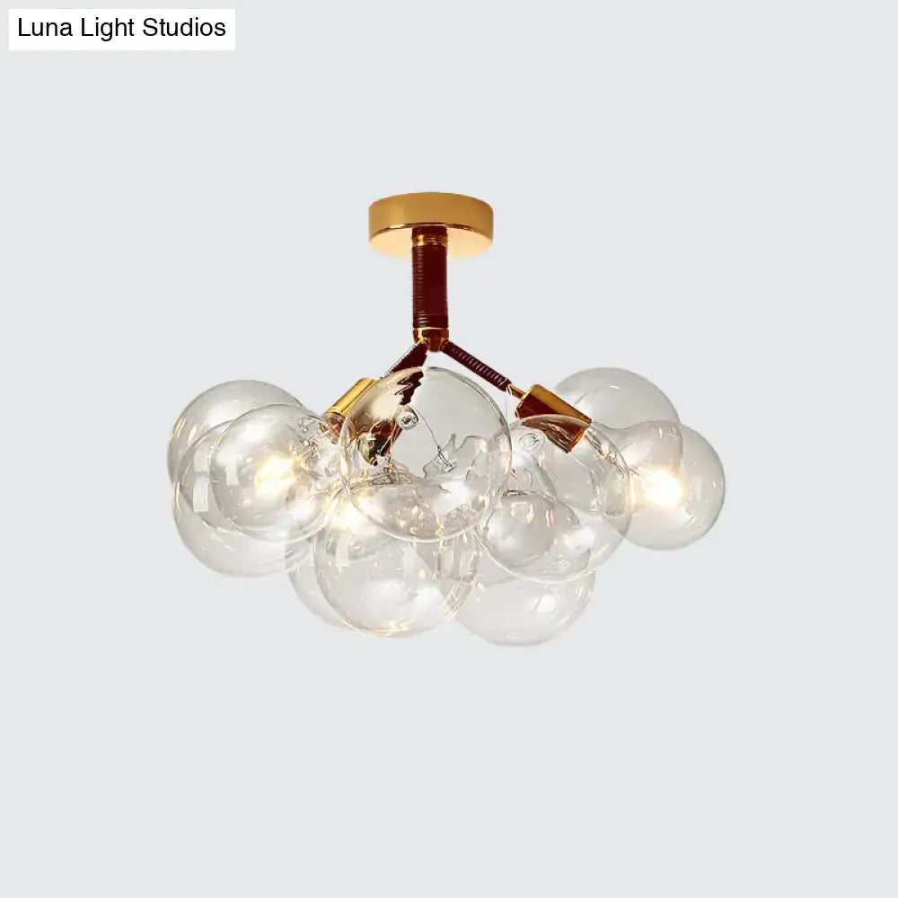Decorbites clear glass semi flush ceiling light with brass accents and bubble design for foyer and corridor illumination