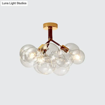 Decorbites clear glass semi flush ceiling light with brass accents and bubble design for foyer and corridor illumination