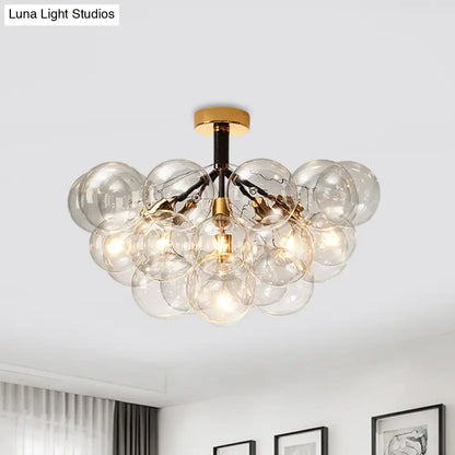 Decorbites™ clear glass semi flush ceiling light with brass accents and exposed filament bulbs for foyer illumination