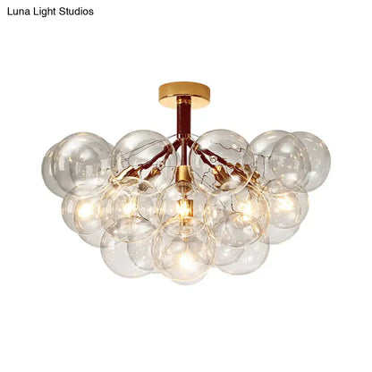 Gold-toned semi flush ceiling light with clear glass bubbles for contemporary foyer and corridor illumination by DecorBites