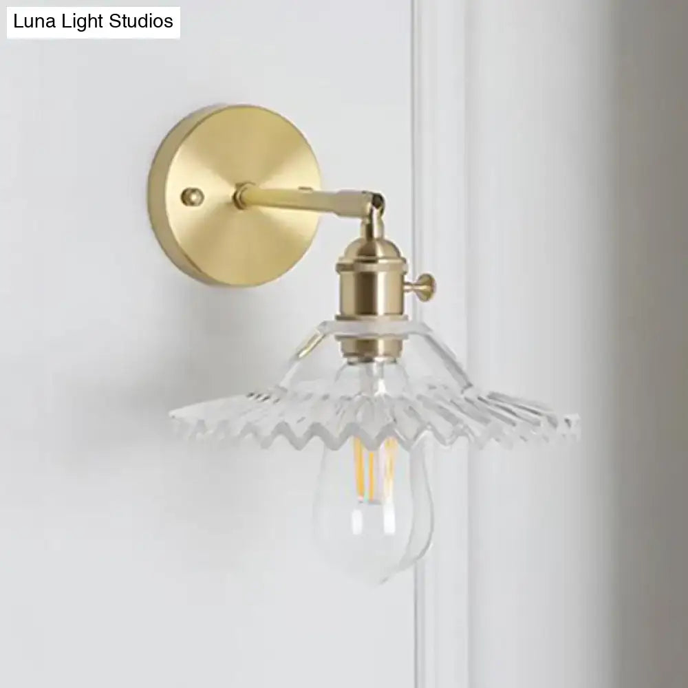 Brass finished industrial wall sconce with clear scalloped glass shade and e26 e27 exposed filament bulb for living room