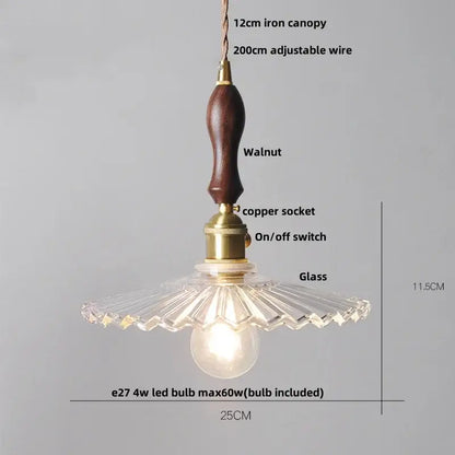 Decorbites clear leaf pendant light with dark walnut handle brass accents and clear fluted glass shade for dining room