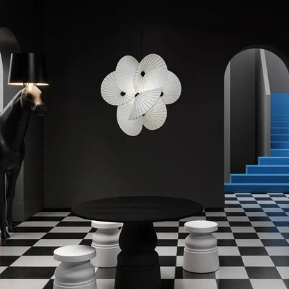White flower-shaped decorbites cloth minimalist led chandelier with radial pattern and black accents for dining room fan