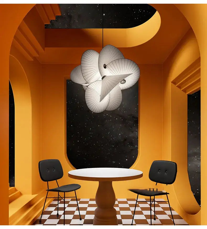 A modern white cloud-shaped decorbites cloth minimalist led chandelier with sculptural design for dining room
