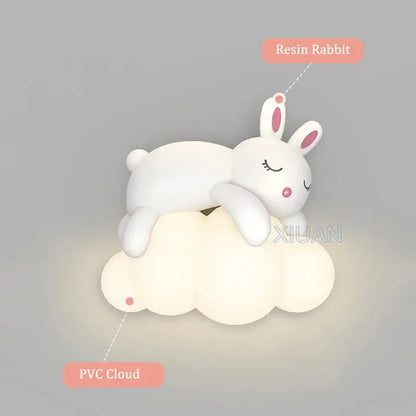 Cute white resin rabbit perched on glowing pvc cloud in decorbites cloud bunny lamp for bedroom wall light