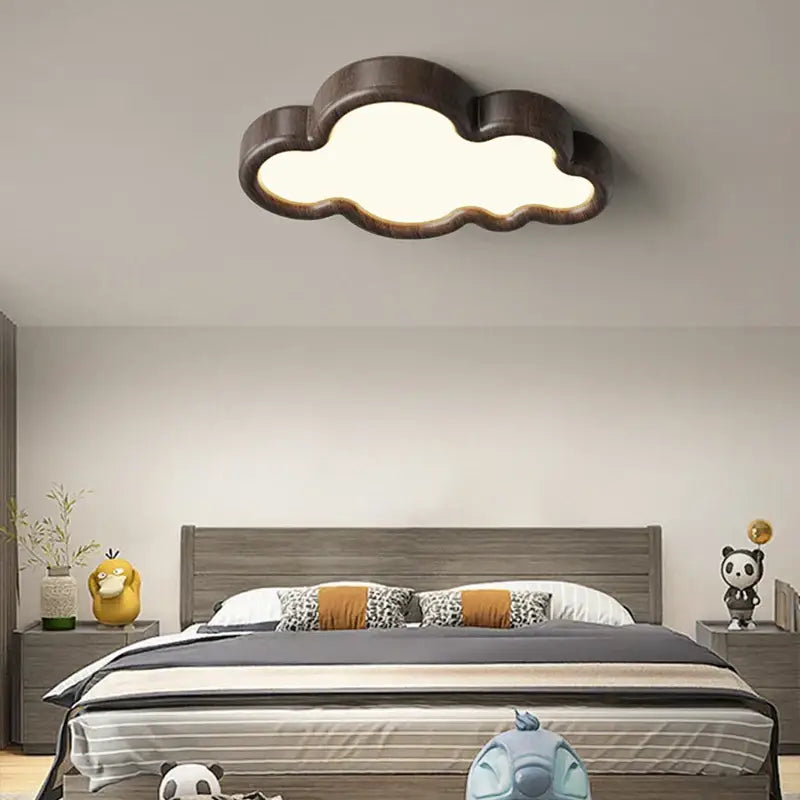 A warm decorbites cloud led chandelier with natural dark wood finish and soft glow for child room lighting