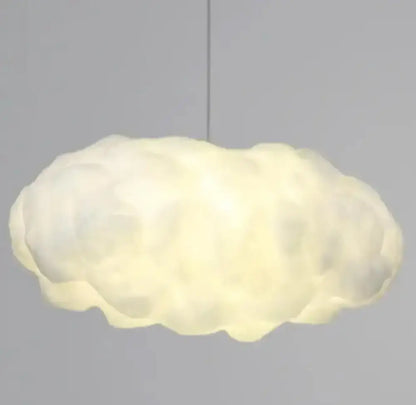 A soft glowing white decorbites cloud led pendant light with textured fluffy design for bedroom use