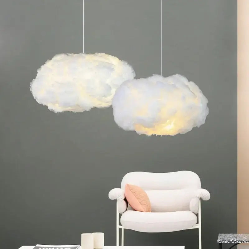 Two fluffy cloud led pendant lights by decorbites in white and pale yellow for bedroom illumination