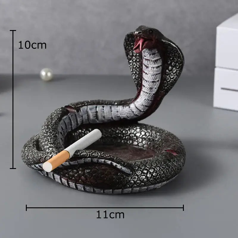 Decorbites cobra ashtray in black and silver resin features textured scales raised hood and open mouth for office use