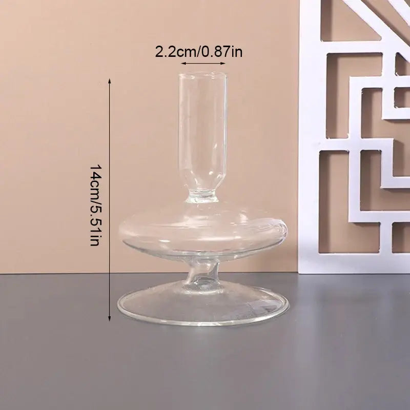 Clear glass vase with slender stem and wide flat base for stylish home decor by DecorBites™