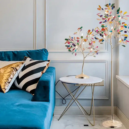 A tall slender floor lamp with a golden base and colorful agate chandelier leaves for dining room and bedroom decorbites colorful
