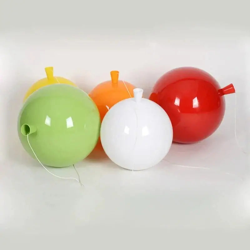 A set of five glossy spherical balloons in yellow green orange white and red as part of decorbites colorful balloon memory led wall lamp