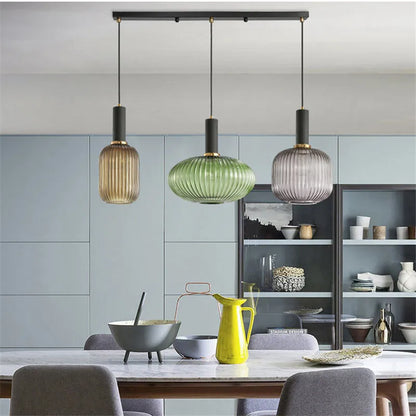 DecorBites™ pendant lights with colorful ribbed glass shades in amber green and grayish-blue for retro style
