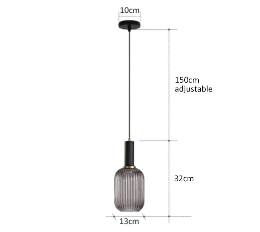 A sleek 150cm adjustable black pendant light with ribbed smoked glass shade and brass accents from DecorBites™ colorful glass pendant lights for retro style