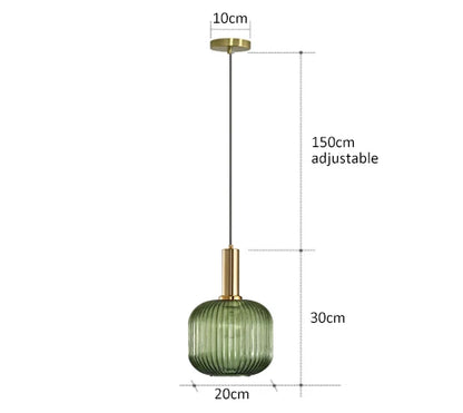 Decorbites™ colorful glass pendant lights featuring green ribbed glass with brass accents and adjustable chain
