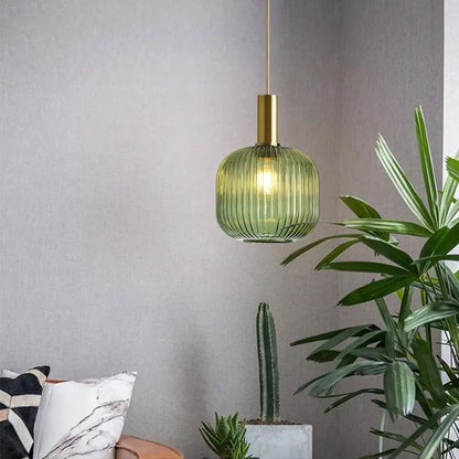 DecorBites green ribbed glass pendant lights with brass finish offer colorful glass pendant lights for retro style