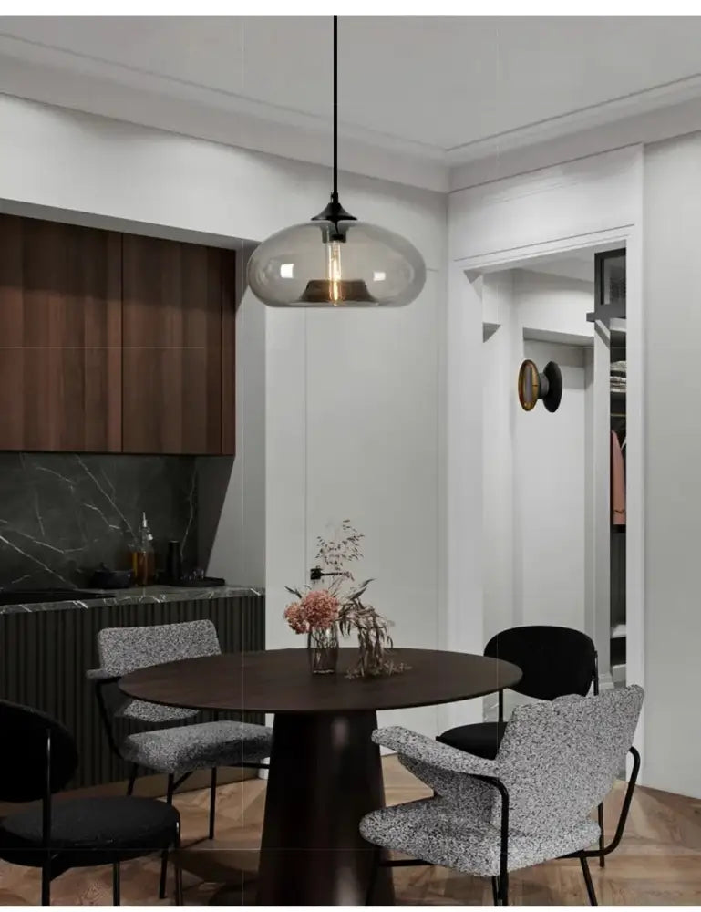 Modern glass colorful led pendant lights with sleek black metal fixture and warm bulb for restaurant decorbites