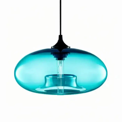 A sleek translucent turquoise glass colorful led pendant light with black metal suspension for restaurant decor