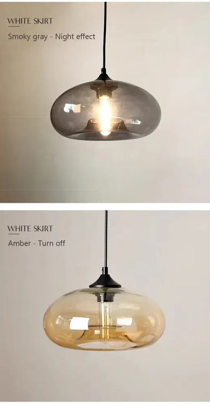 A sleek glass colorful LED pendant light with a smooth rounded dome and amber glow for restaurant decor