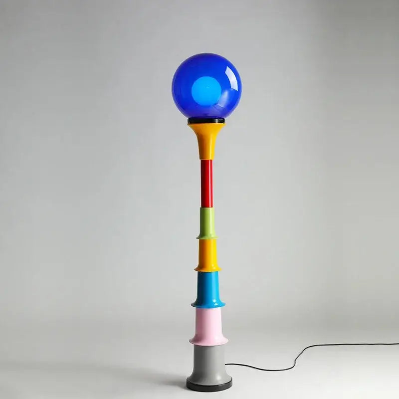 Decorbites colorful memphis floor lamp with glossy blue top and stacked yellow red green pink gray segments for bedroom